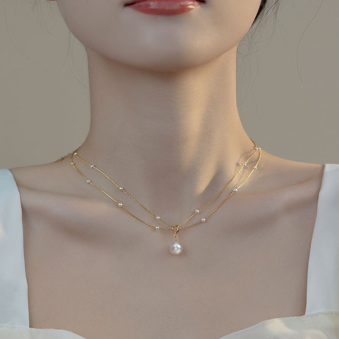 Wholesale Pearl necklace, pearl wrapped gold necklace, versatile and high-end for women, layered and worn