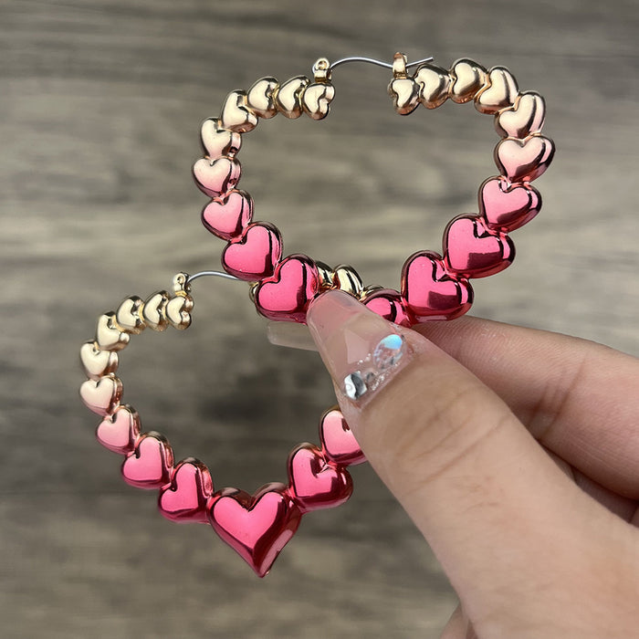 Wholesale Valentine's Day Turning Heart Circle Alloy Earrings JDC-ES-YeB002