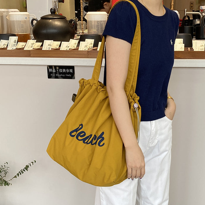 Wholesale Artistic lazy canvas bag, casual versatile shoulder bag, large capacity tote bag