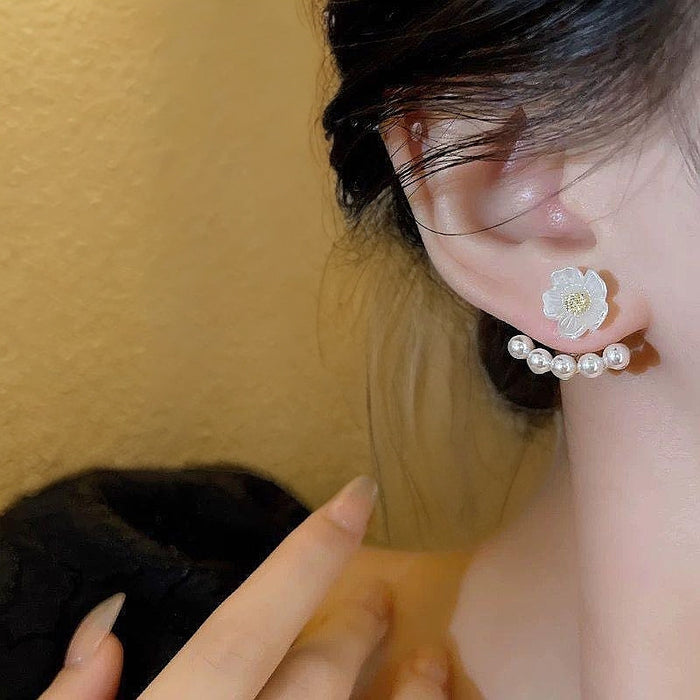 Wholesale Imitation pearl camellia earrings, a two on pearl earring with a light luxury and fashionable temperament