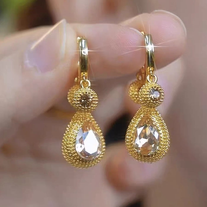 Wholesale Light luxury high-end coffee colored zircon earrings for women, with a niche design and versatile temperament. Earrings with fashionable water droplet earrings and buckles