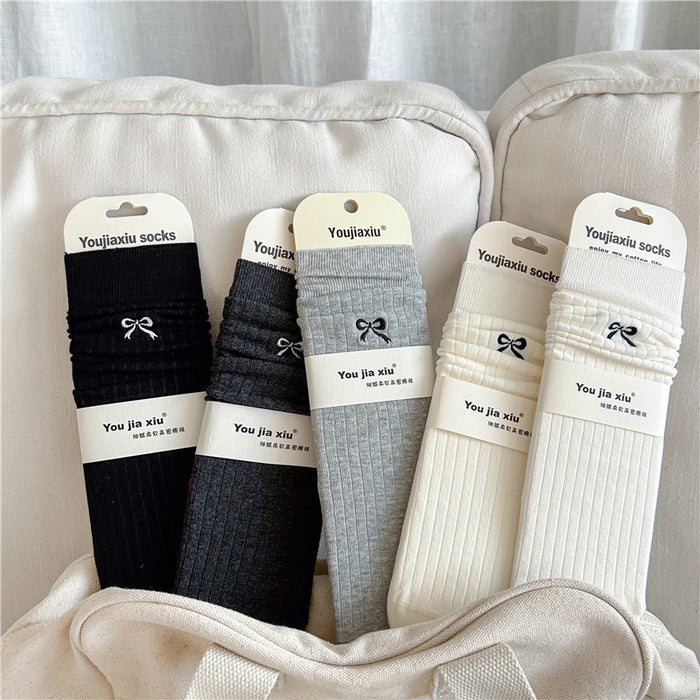 Wholesale Butterfly knot embroidered socks, solid color boneless pile socks, white socks