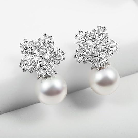 Wholesale Fashionable temperament, design sense, snowflake pearl earrings, pure silver needles, trendy earrings, earrings