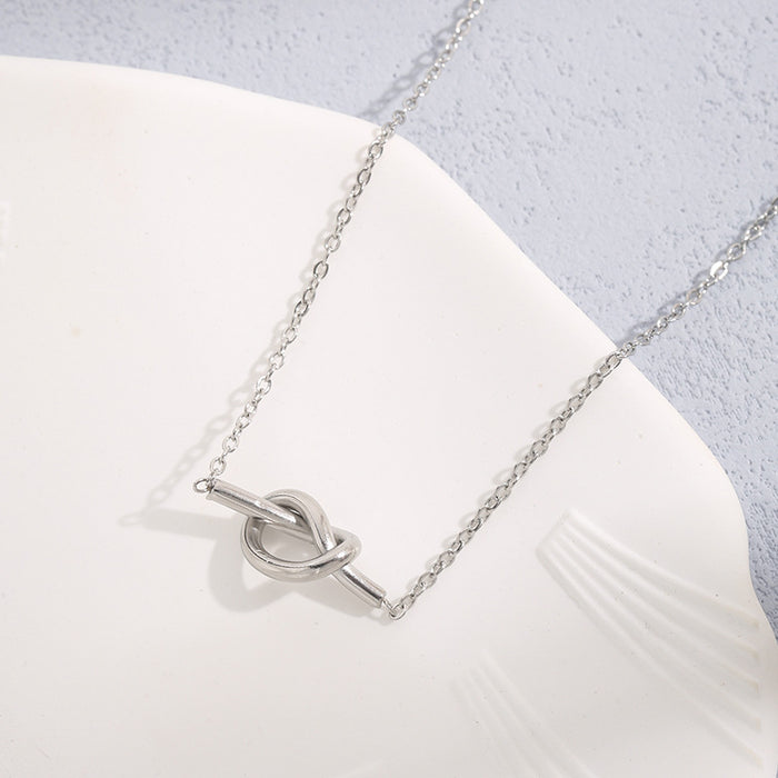 Wholesale Cross border new niche knot double heart winding pendant titanium steel O-shaped necklace simple and fashionable temperament exquisite