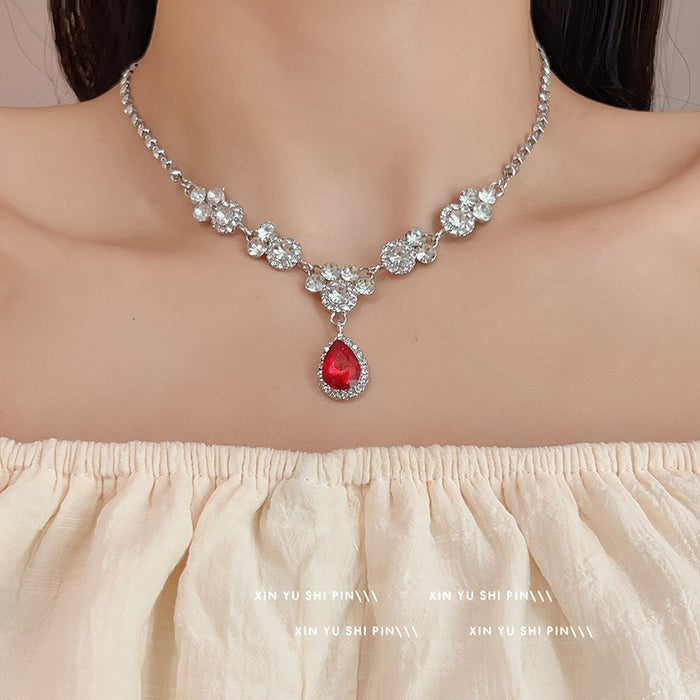 Wholesale Light luxury sparkling diamond water droplet fringe necklace, niche design, high-end temperament, versatile butterfly pendant, collarbone chain