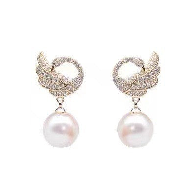 Wholesale Exquisite and elegant diamond studded pearl earrings, high-end and luxurious commuting versatile earrings, stylish and elegant style