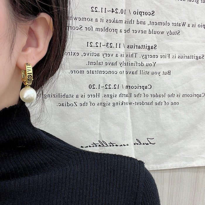 Wholesale medieval vintage distressed Saturn planet pearl ear buckle niche design earrings