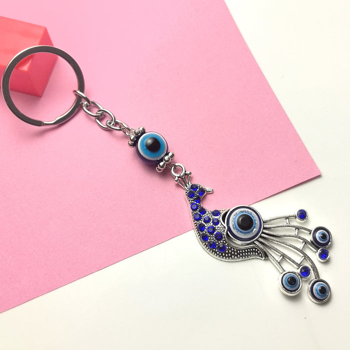 Wholesale Blue Eye Pendant Flower Butterfly Keychain Pendant Bag