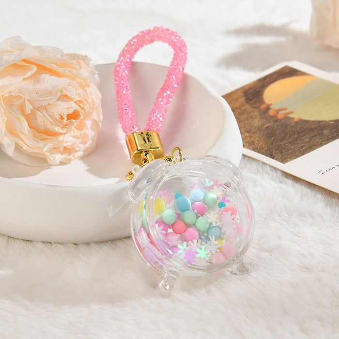 Wholesale Acrylic oil bottle candy Bean astronaut keychain