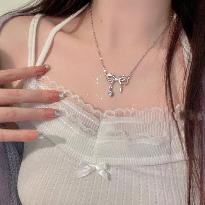 Wholesale Bow studded diamond hollow necklace, light luxury high-end pendant, niche design, collarbone chain