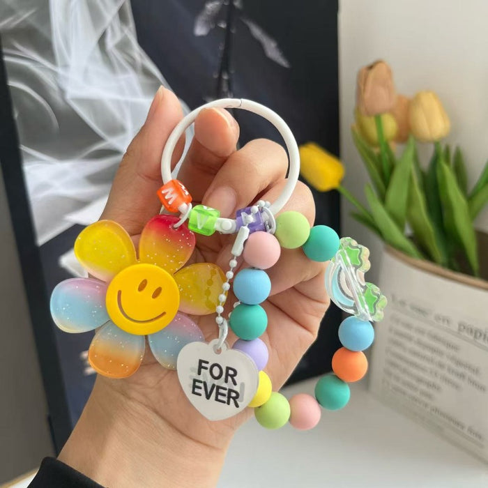 Wholesale Cute letter sunflower bag pendant with smiling face, colorful handmade bead key chain