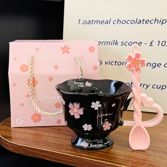 Wholesale Pink ceramic stemmed cup with cherry blossom relief design and spoon