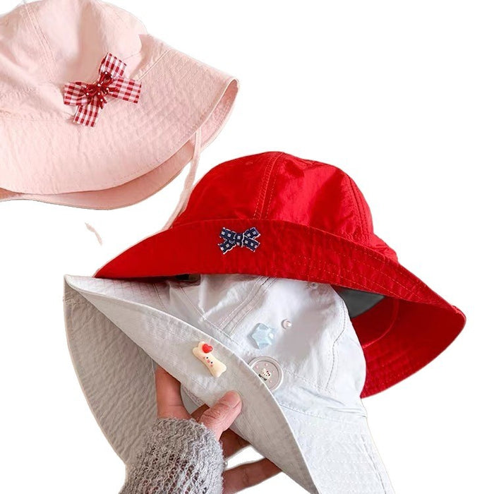 Wholesale Wholesale bow button quick drying fisherman hat, thin version, breathable flip eave basin hat, sunshade and sun protection hat