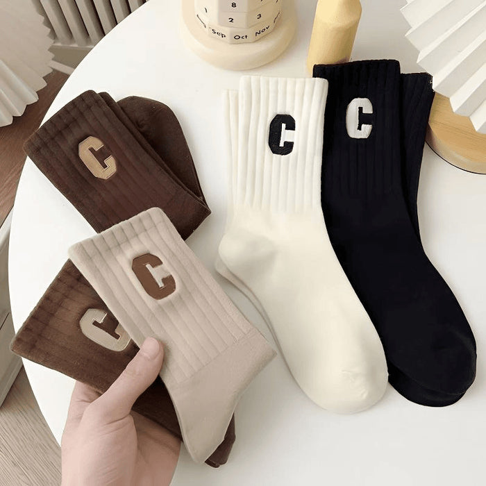 Wholesale Letter socks versatile mid tube socks soft and breathable for sports