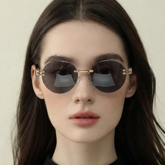 Wholesale Rimless Gold Frame Round Sunglasses UV400 Trendy Street Style for Women