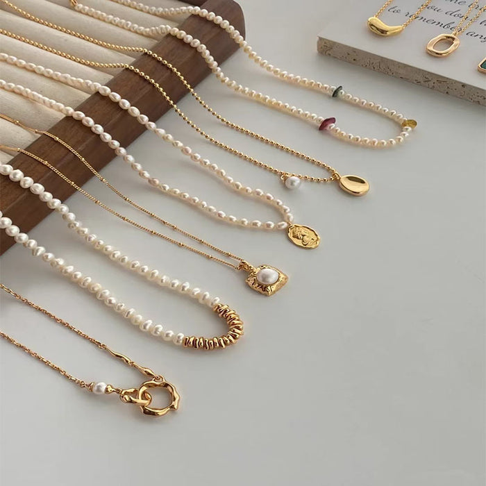 Wholesale Pearl necklace for women, light luxury, niche design, high-end feeling, collarbone chain, retro necklace, sweater chain, accessory