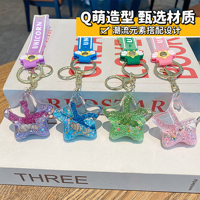 Wholesale Starfish Oil Flow Bottle Keychain Acrylic Pink Gift Bag Charm