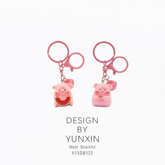 Wholesale Cute three-dimensional super cute bell pig keychain pendant backpack decoration pendant couple