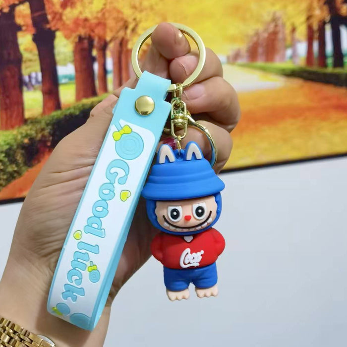 Wholesale Cute cartoon trendy schoolbag pendant keychain furry cute little monster