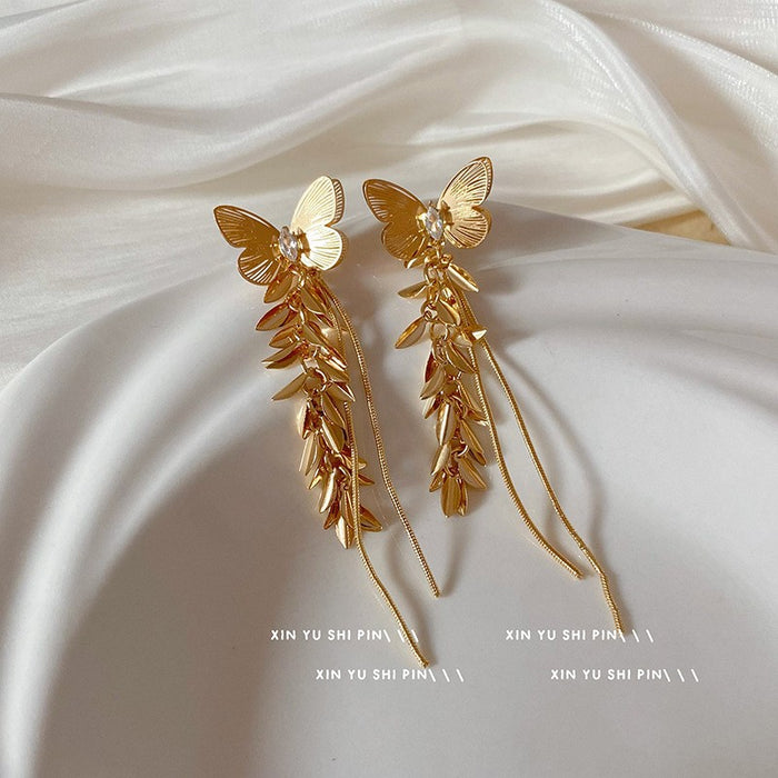 Wholesale Vintage metallic floral tassel earrings with a light luxury and high-end feel, niche design temperament, versatile and long earrings