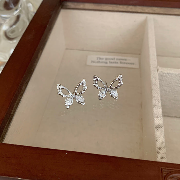 Wholesale Silver needle hollowed out butterfly earrings, niche design, exquisite earrings, high-end fashion, versatile earrings