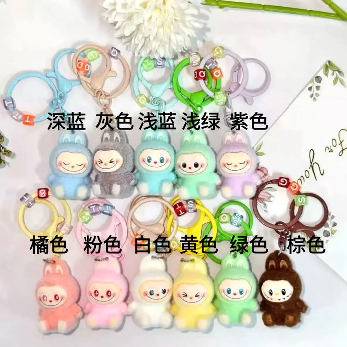 Wholesale flocked cute key doll keychain