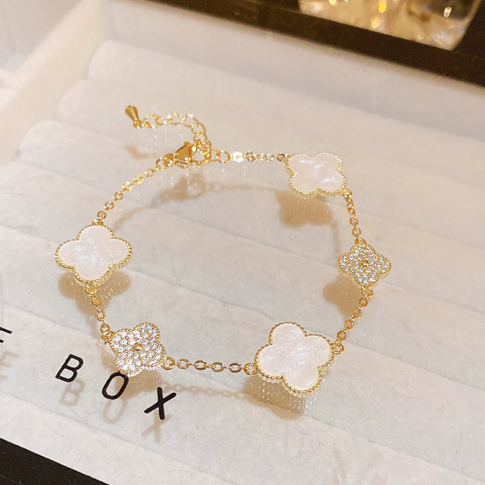 Wholesale Real Gold Electroplated Zircon Four-petal Flower Imitation Fritillaria Bracelet Light Luxury High-end Sense Bracelet Sweet All-match Bracelet Wholesale Women