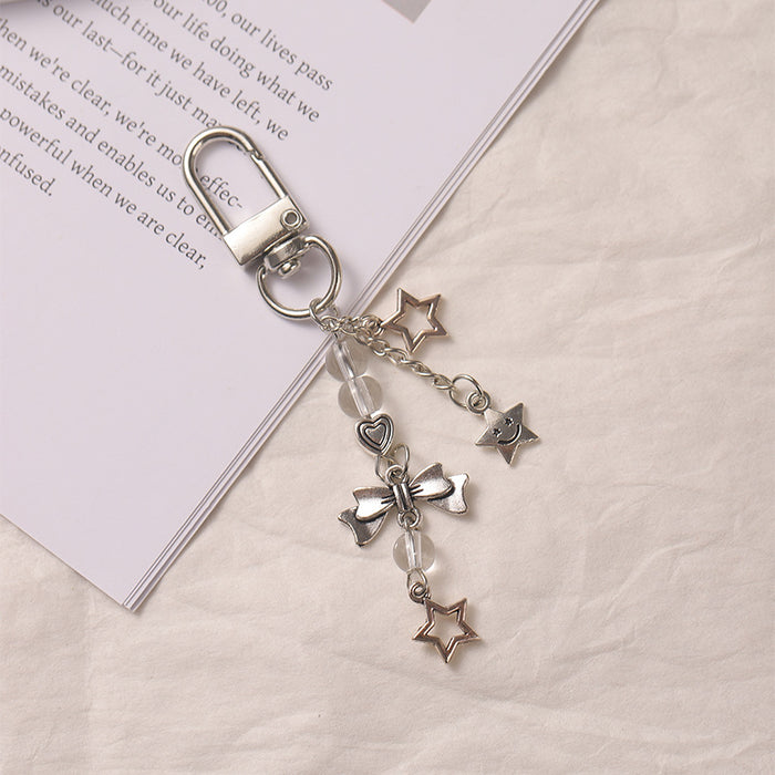 Wholesale Sweet silver star bow mobile phone chain pendant bag pendant keychain