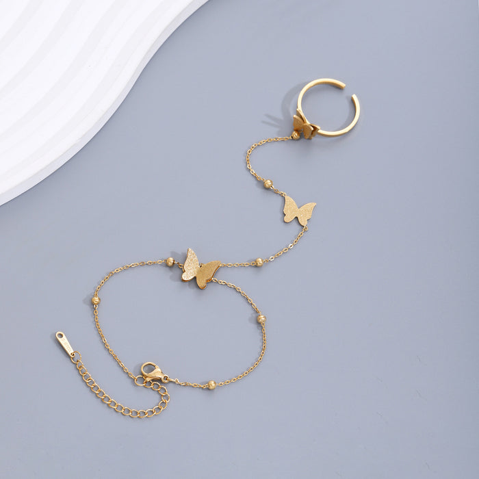 Wholesale Fashion girl bracelet with frosted butterfly titanium steel beads, adjustable opening ring, finger chain