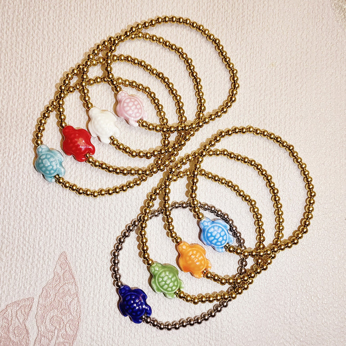 Wholesale Swimming wearable mini bracelet accessory ceramic conch animal turtle titanium steel non fading bracelet