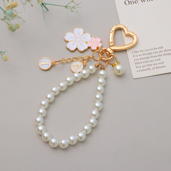 Wholesale Flower Pearl Pendant Keychain Girl Beaded Mobile Phone Chain Headset Bag Pendant