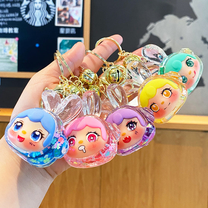 Wholesale Oil-flow sand earphone rabbit keychain
