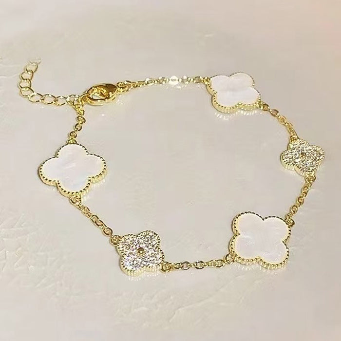 Wholesale Four leaf clover bracelet with a light luxury and high-end feel, niche design, zircon super sparkling temperament bracelet