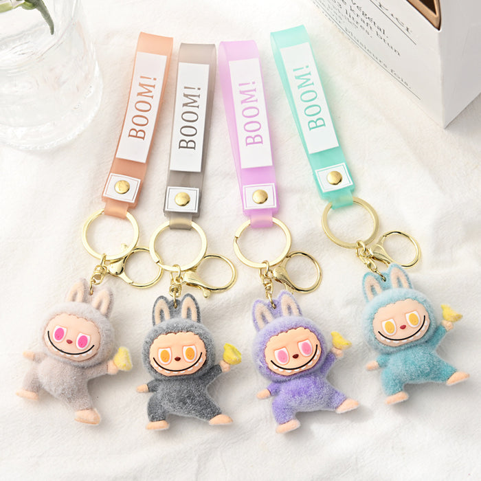 Wholesale Flocking Yoga Little Monster Keychain Small Pendant Cartoon Cute Doll Keychain Small Gift