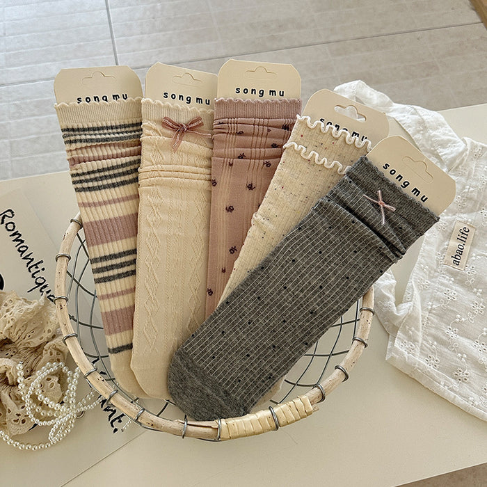 Wholesale Butterfly knot socks, children's mid tube socks, lace cotton mesh hollow pile socks