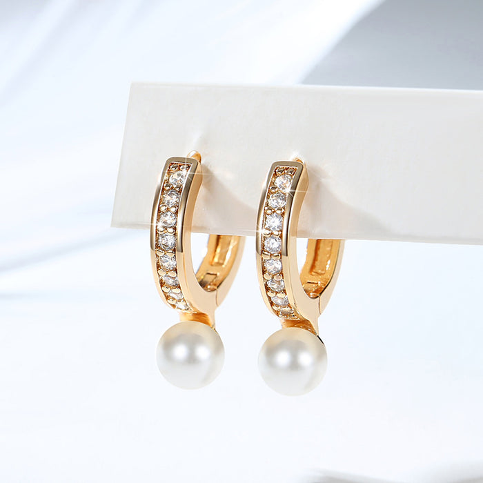 Wholesale Copper gold-plated retro light luxury simple pearl earrings, small and fashionable design, inlaid with zircon ear buckles, wholesale of ear accessories
