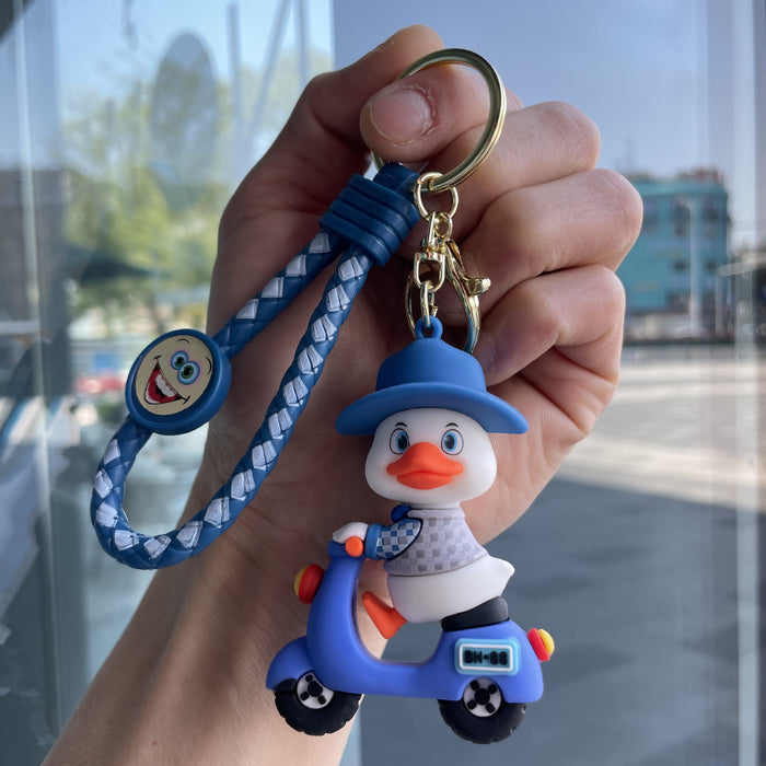 Wholesale Tram couple duck keychain couple backpack pendant claw machine doll car keychain exquisite small gift wholesale