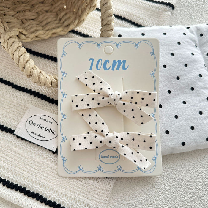 Wholesale Sweet bow hair clip with water droplets, wavy dots, children's fabric, side broken hair, wavy dots, bangs clip