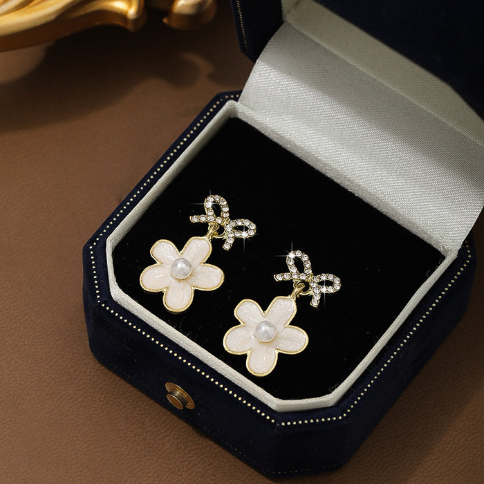 Wholesale Elegant pearl earrings, light luxury, niche, high-end feeling, earrings, butterfly bow flower earrings