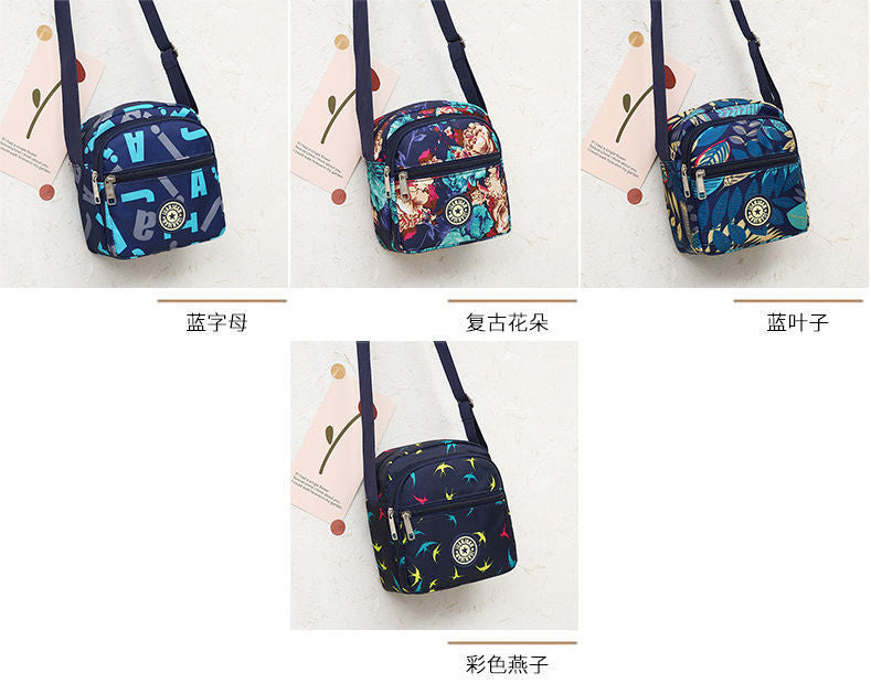 Wholesale Classic floral fabric shoulder bag, small square bag, Oxford fabric phone bag, diagonal cross bag, night market women's bag