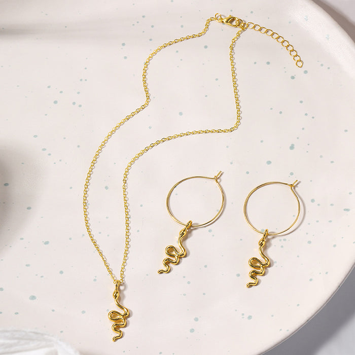 Wholesale Golden snake necklace, exaggerated circle earrings set, niche pendant jewelry