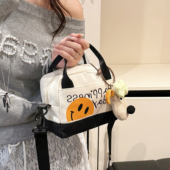 Wholesale Cute smiling face backpack for travel and commuting, hand-held canvas bag