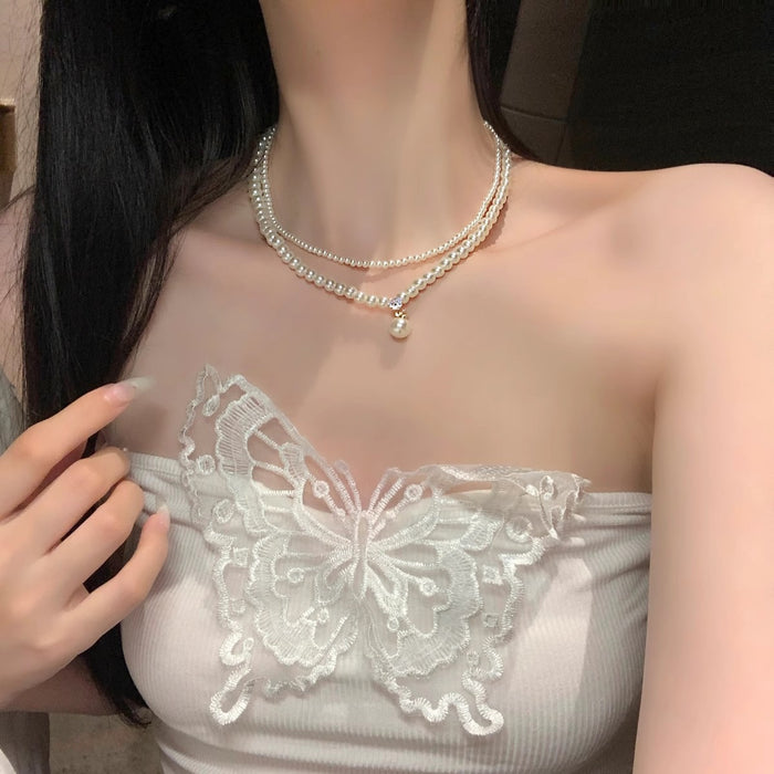 Wholesale Retro pearl double layered necklace with high-end feel, light luxury, niche collarbone chain