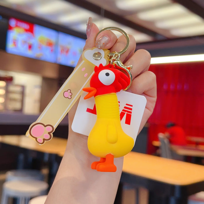 Wholesale Retractable animal pendant PVC doll keychain