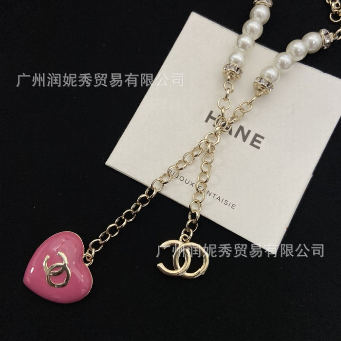 Wholesale Gradient tassel heart-shaped pearl necklace, pink diamond heart-shaped collarbone chain