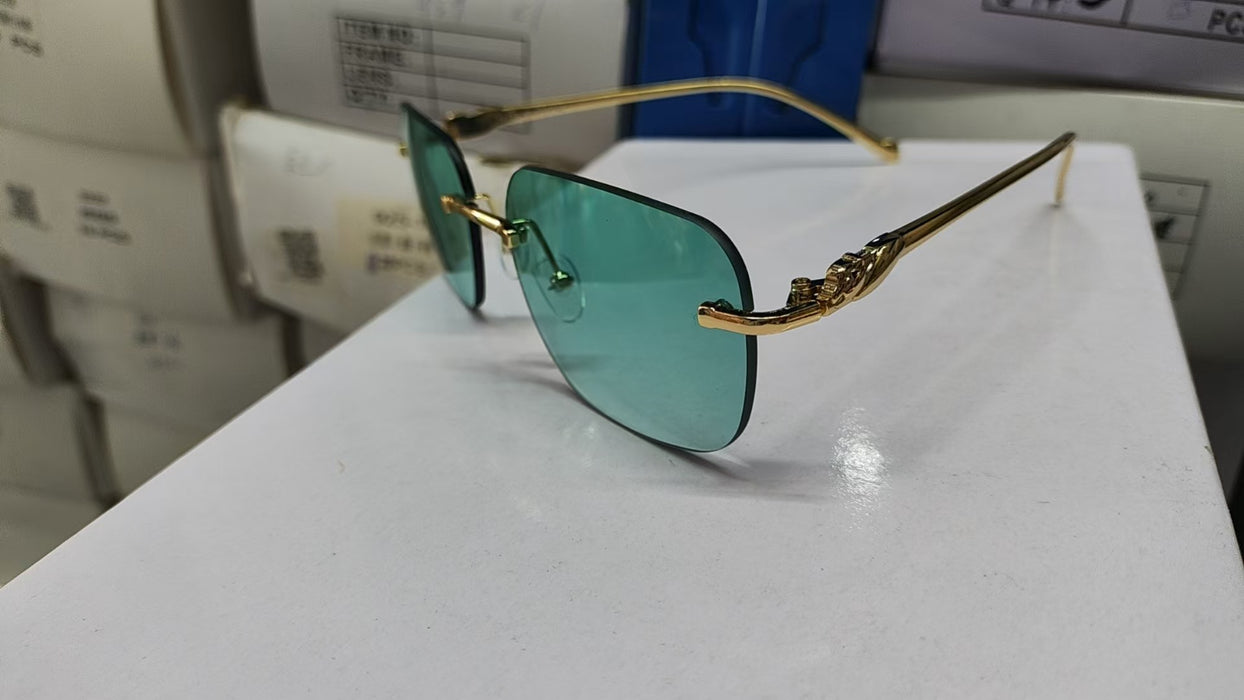 Wholesale Women's fashionable frameless sunglasses women's fashionable small frame trimming sunglasses women's glasses sunglasses