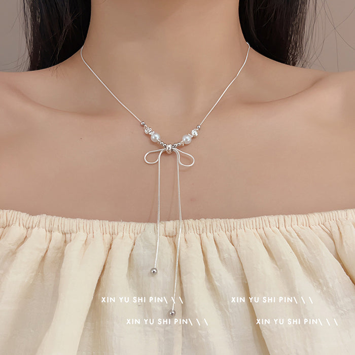 Wholesale Super beautiful bow long necklace, light luxury temperament, niche collarbone chain, fashionable and versatile necklace