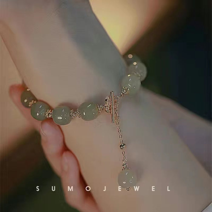 Wholesale Small niche design gold bell pendant bracelet