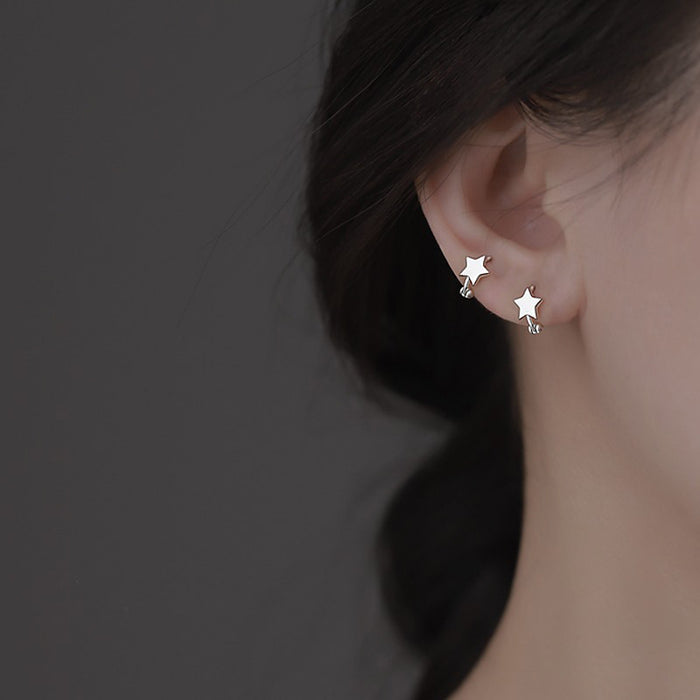 Wholesale Earrings with fashionable ear loops, niche smooth surface design, simple star shaped earrings