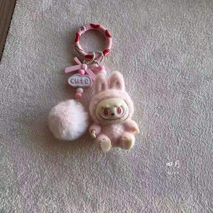 Wholesale Cute mini flocked sitting posture toy